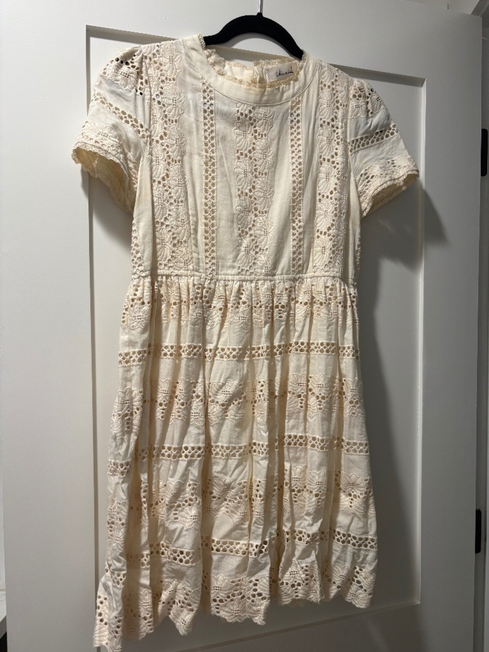 Cream lace dress with daisy detailing